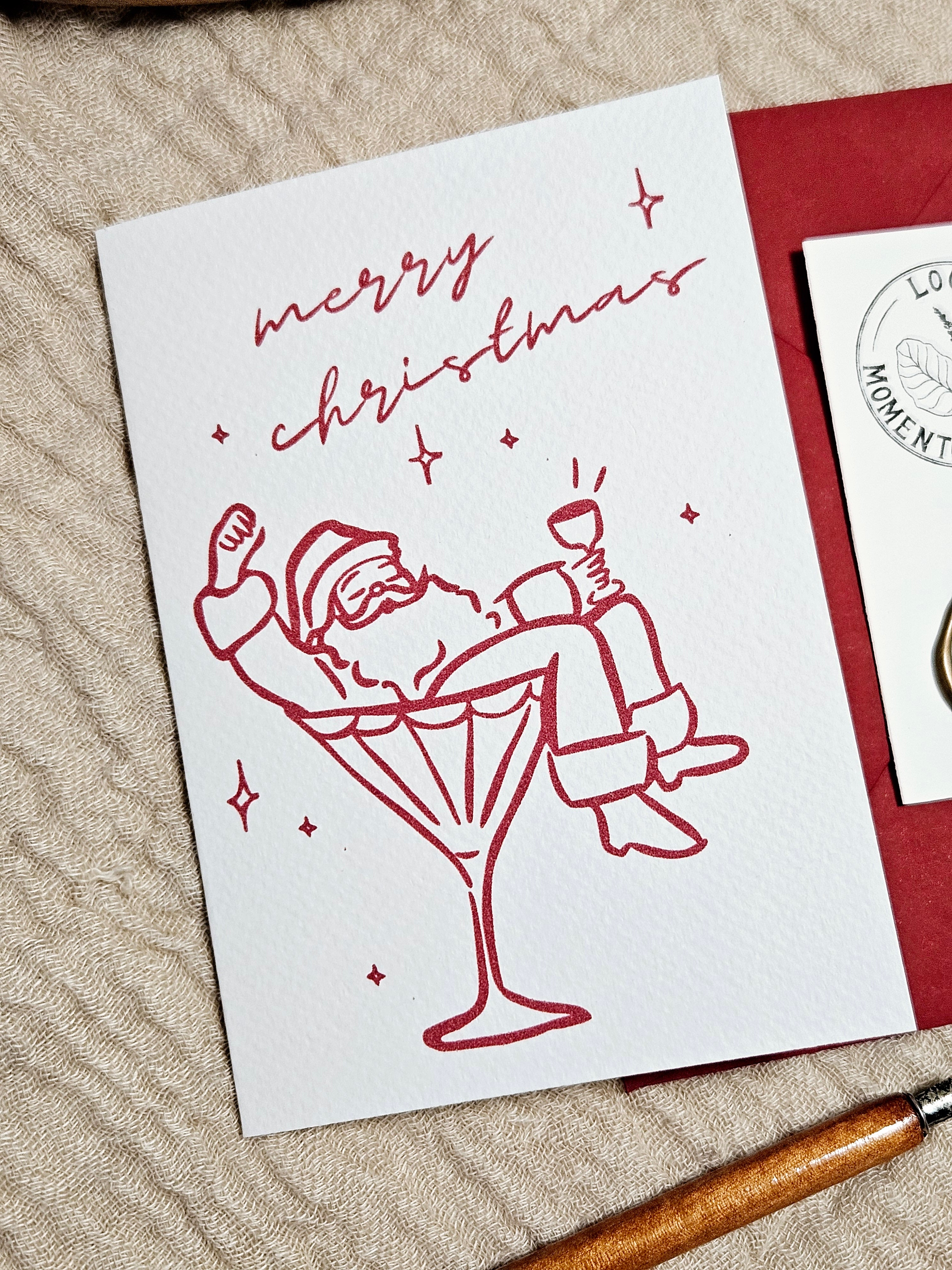 Weihnachtskarte Weihnachtsmann Martini Glas