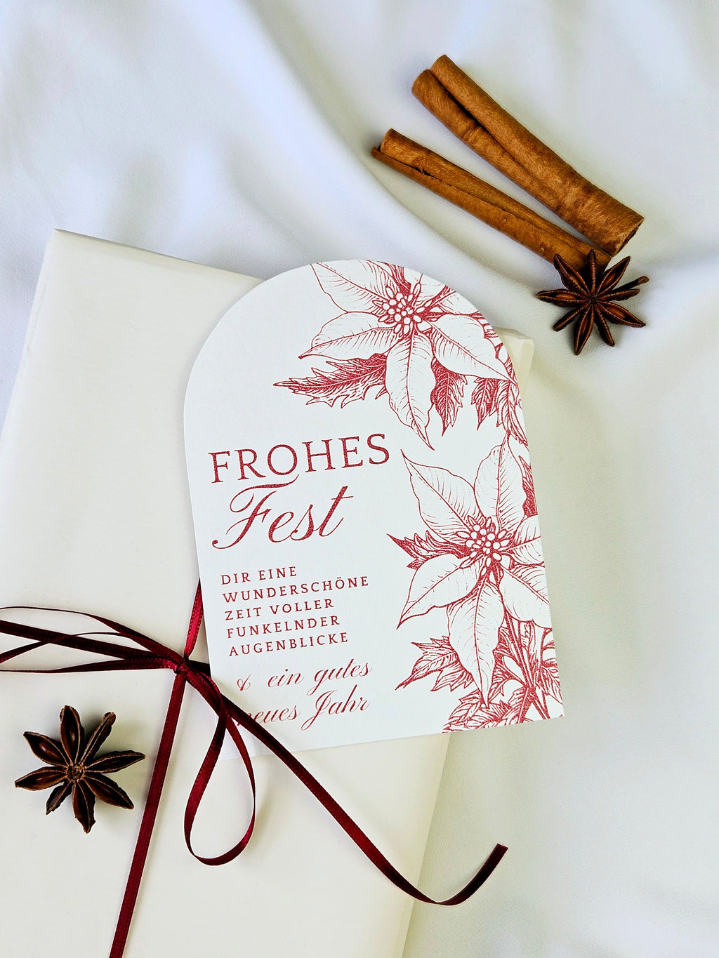 Elegante Weihnachtskarte Weihnachtssterne Bogen