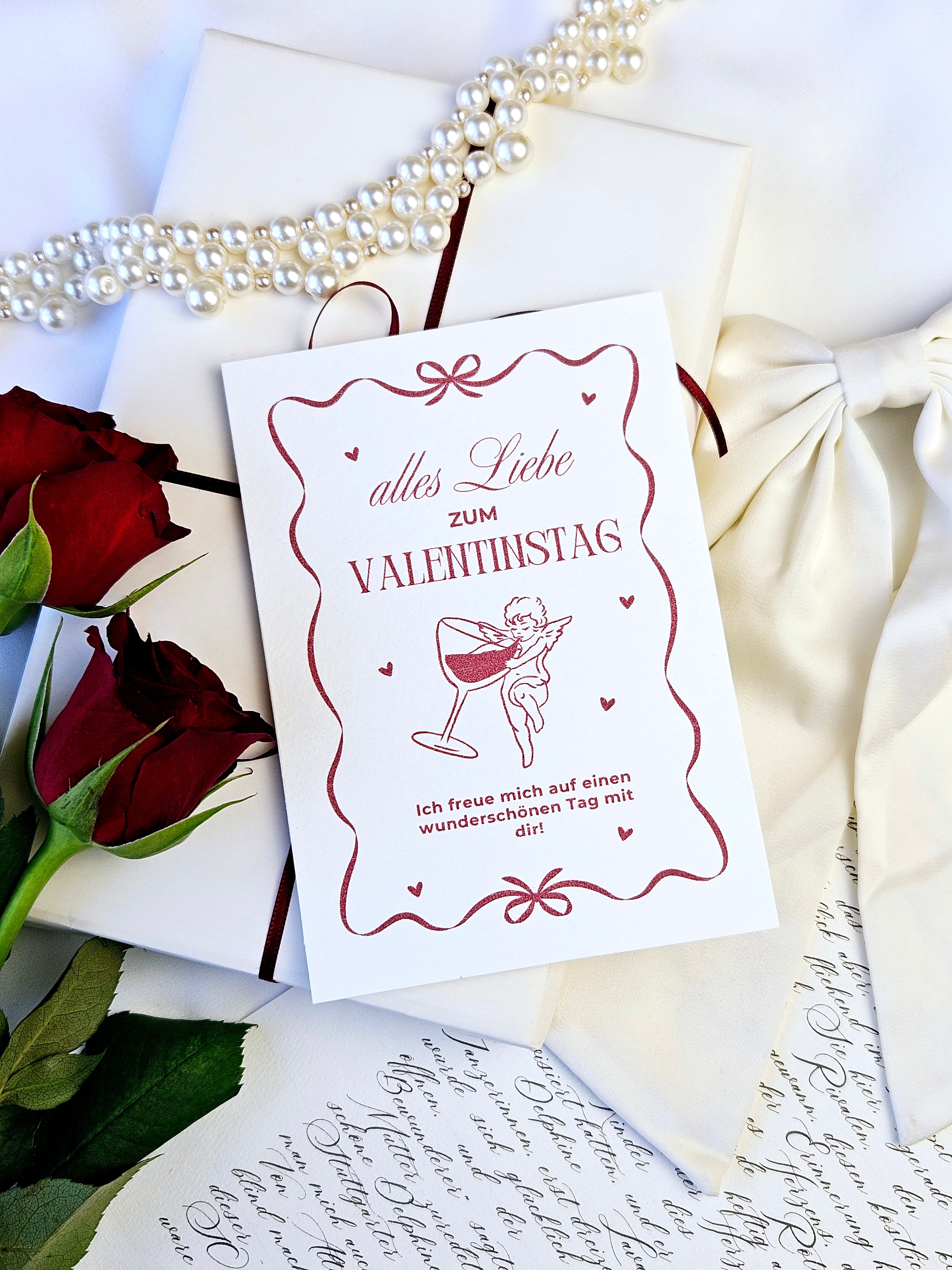 Valentinstagskarte Amor & Schleifenrahmen