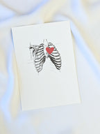 Postkarte Herz in der Brust